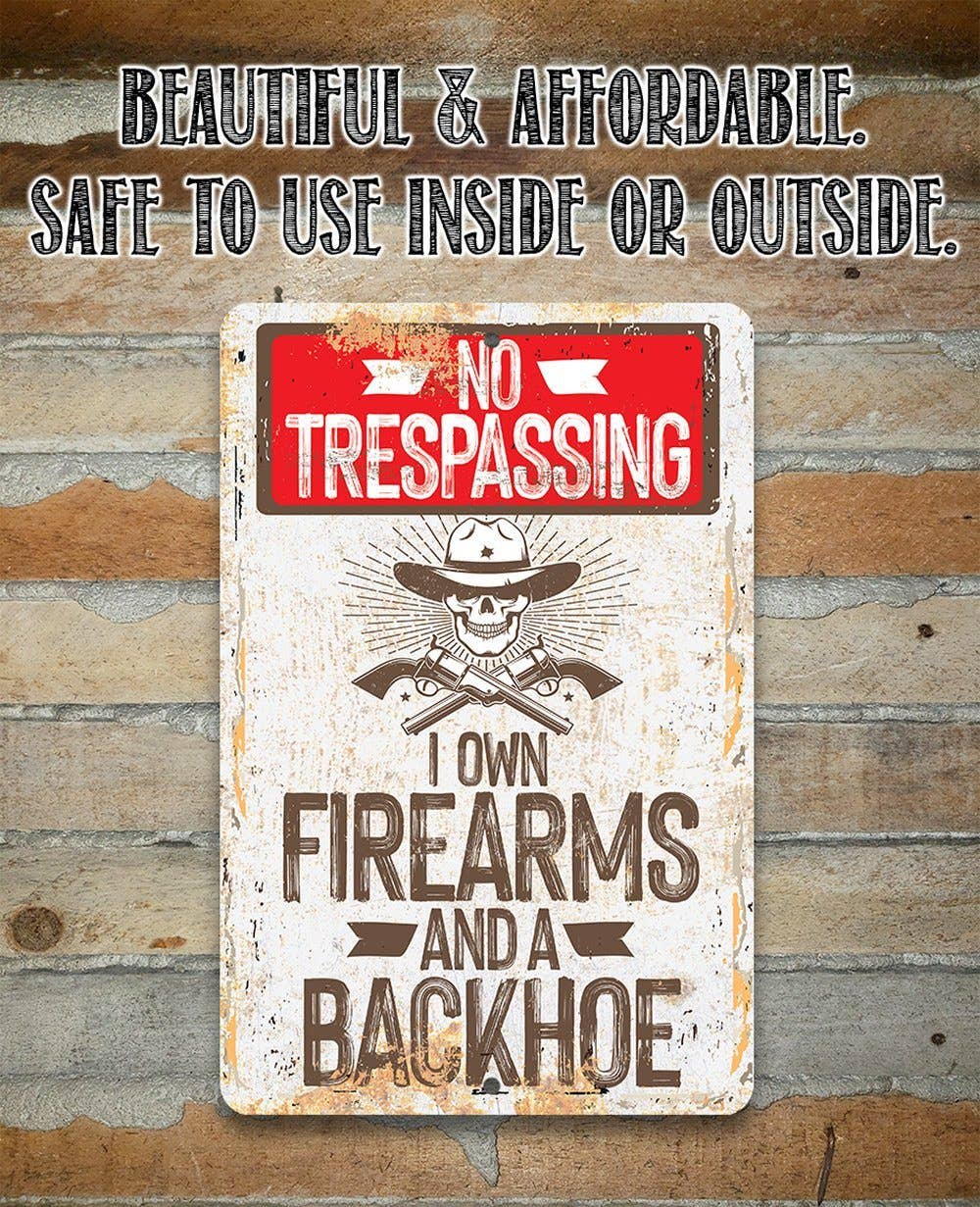 I Own Firearms and a Backhoe  - Metal Sign
